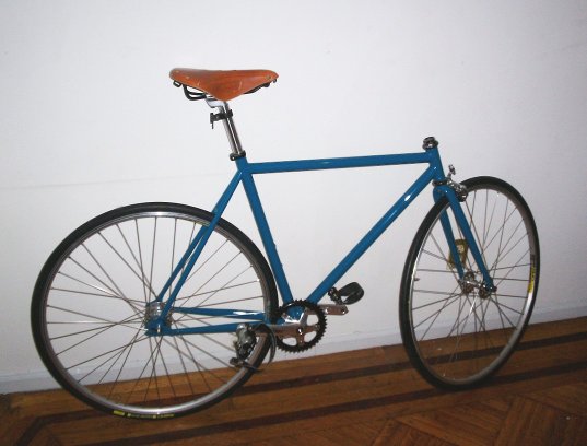 Frame with wheels, pedals, seat