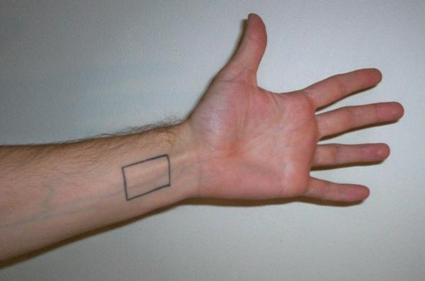 Rectangle on inside of left wrist