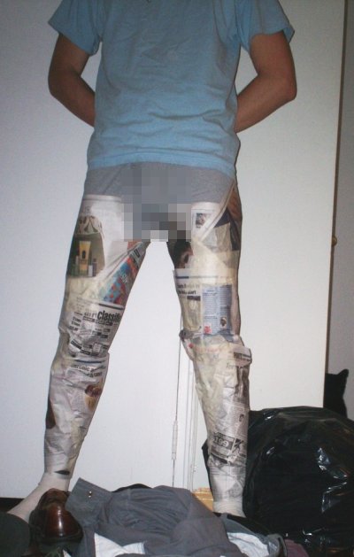 My legs wrapped in newspaper